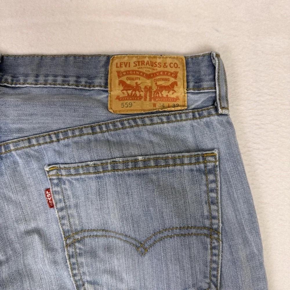 Levi's 559 Relaxed Straight Jeans Men's 34x32 Light‎ Wash Distressed Denim